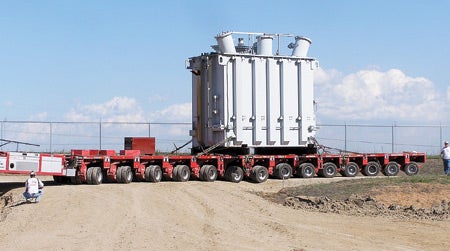 5.	Close quarters. Barnhart used a 14-line Goldhofer electronically steered trailer to maneuver a new transformer into place at this combined-cycle plant being built in Kansas. Courtesy: Barnhart Crane & Rigging