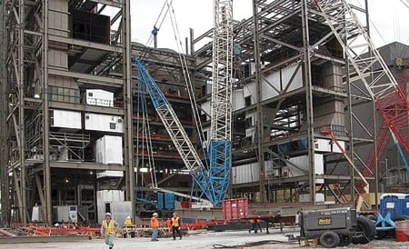 10. Parallel processing. Hitachi has perfected simultaneous erection of structural steel and boiler components. The technique shortens construction schedules. Courtesy: Hitachi America Ltd.
