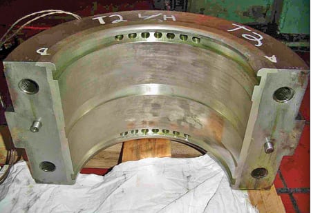 4.	Recycled bearings. The HP turbine’s lower-half bearings with a partial center slot were analyzed as part of the retrofit turbine design and were found to be adequate for the new, heavier rotor. All bearings were rebabbitted during the project. Courtesy: MPS