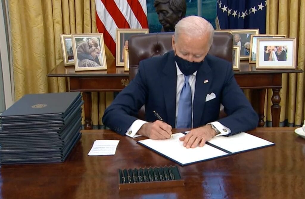 Biden Effects Regulatory Freeze, Revokes Trump Actions, Rejoins Paris Agreement