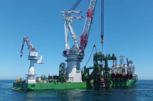 The first six of 176 monopiles for the Coastal Virginia Offshore Wind project were installed in the Northwest corner of the lease area in May. Installation work, scheduled from May 1 to October 31 each year to protect the North Atlantic right whale migration, will continue through 2025. Courtesy: Dominion