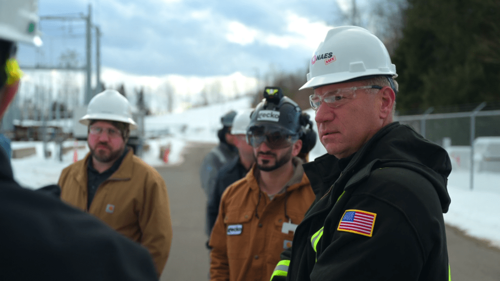 NAES CEO Mark Dobler and Gecko Robotics CEO Jake Loosararian discuss the deployment of AI and robotics for power plant modernization at a NAES facility. Courtesy: NAES/Gecko.