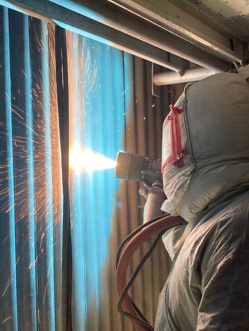 T23-CFB-Boiler-Man-Spraying-HVTS