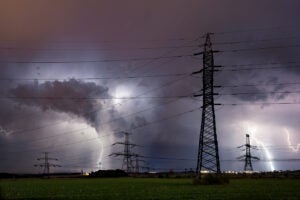 Fig1-high-voltage-electrical-mast-with-lightning-storm-2026-01-06-09-38-30-utc